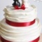 Свадебный двухъярусный торт с воланами и фирменными котиками