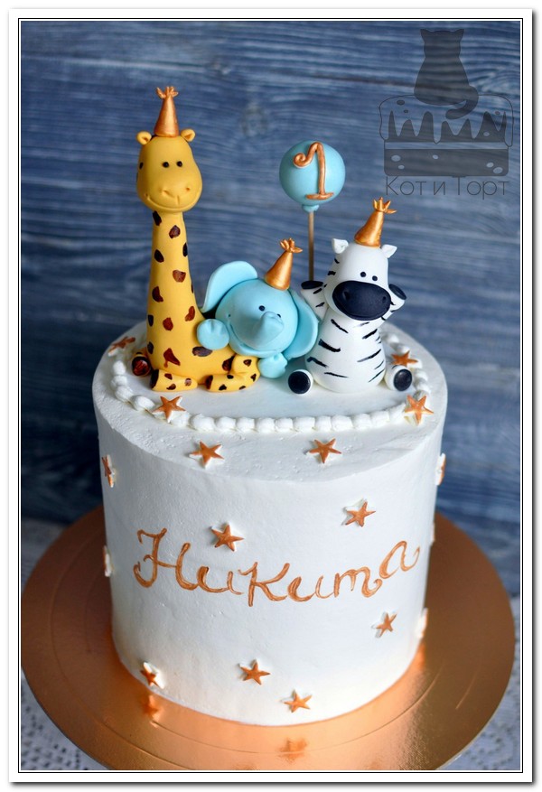 Белый торт с жирафиком, слонёнком и зеброй