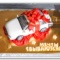 Торт-белая машина с красным бантом
